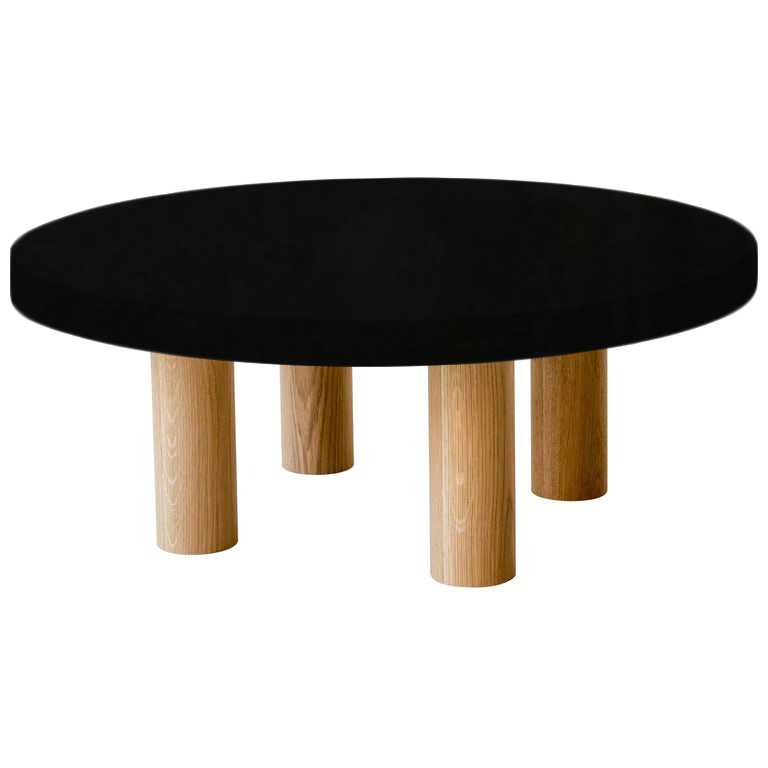 Round Nero Assoluto Coffee Table with Circular Oak Legs